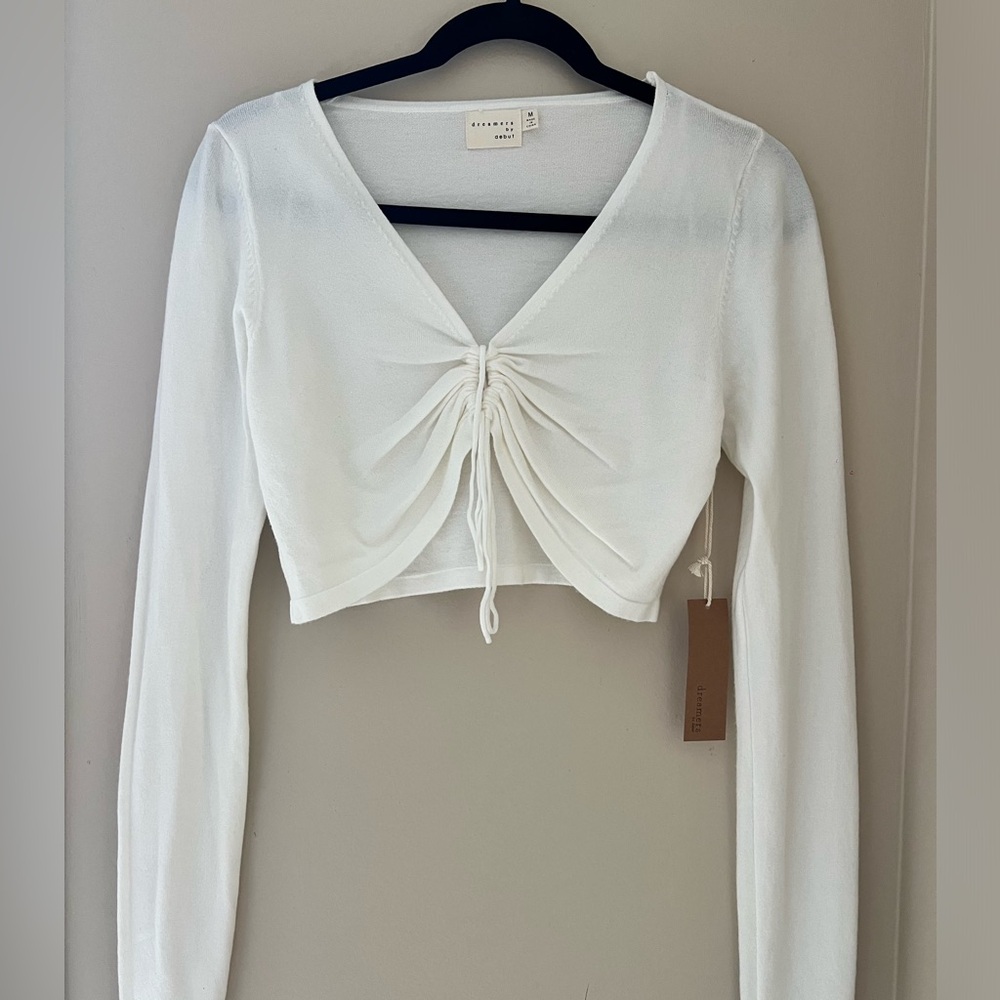 Cream cropped sweater.